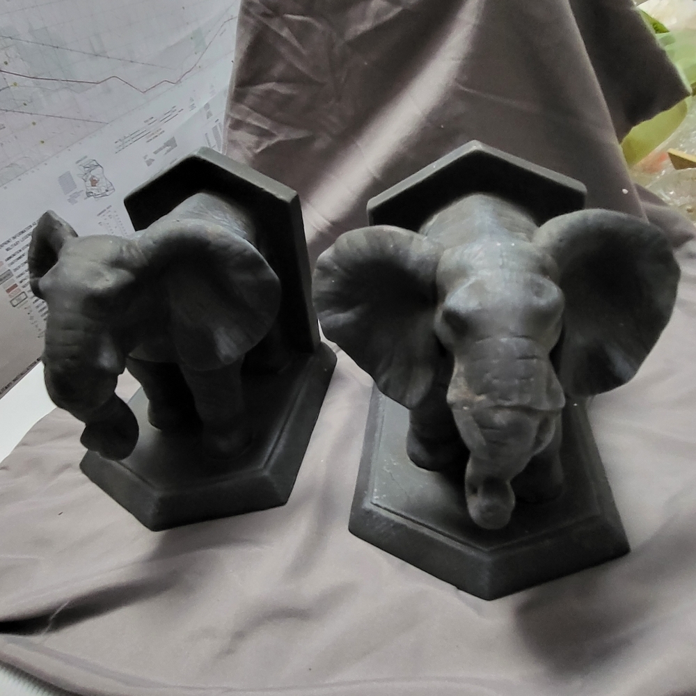 Glorious ceramic bronze like elephant book ends.